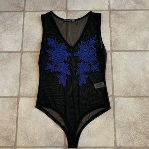 Mesh body suit with blue flowers